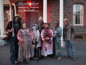 Actors from The Arc of Loudoun County haunted house pose together in their costumes. 